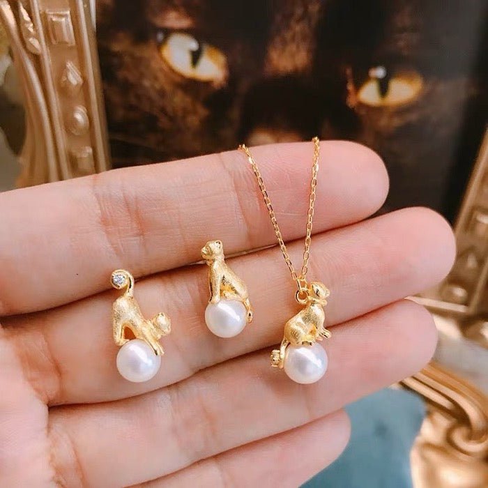 Cute asymmetrical cat earrings and necklace