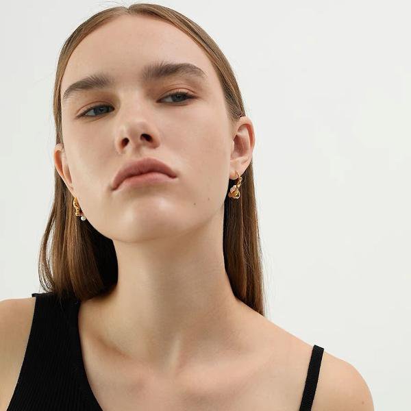 Asymmetrische vloeiende lijn pareloorbellen