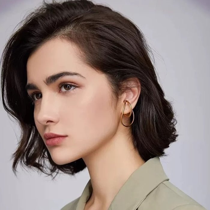 Geometric 3D ear cuffs with flowing lines, one pair