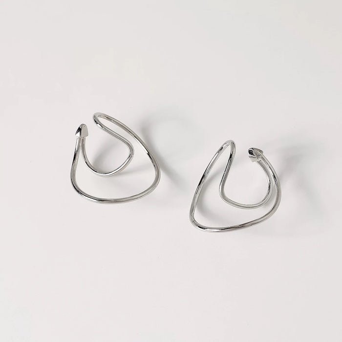 Geometric 3D ear cuffs with flowing lines, one pair