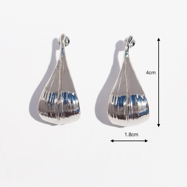 Modern silver curved leaf earrings