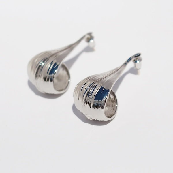 Modern silver curved leaf earrings